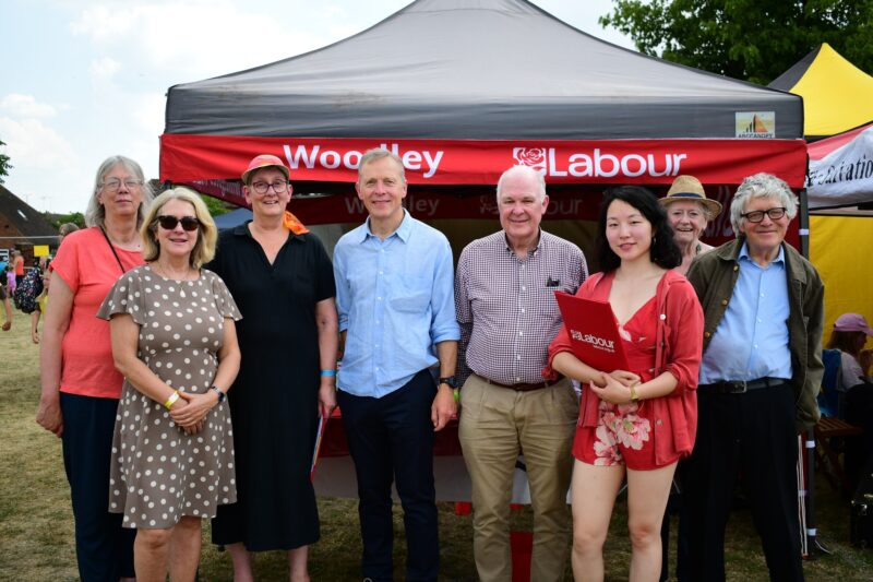 Group photograph outside of the Woodley Labour Stall at Woodley Carnival