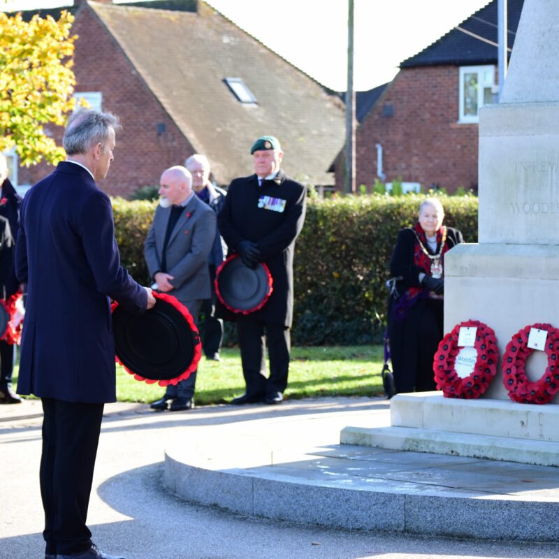 Matt Rodda lays a wreath at the War Memorial in Woodley
